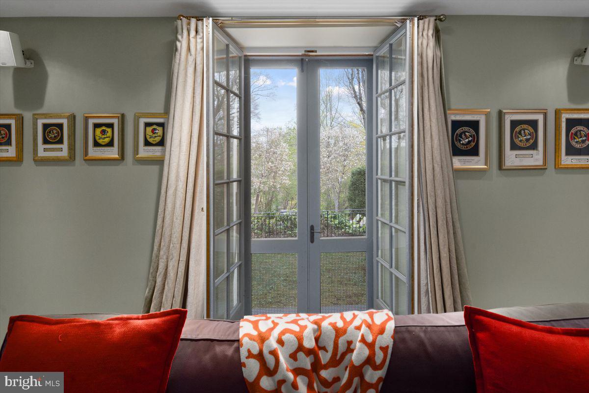 95 West Hampton Road Philadelphia, PA 19118 - Photo 21 of 37 a room with furniture and a window