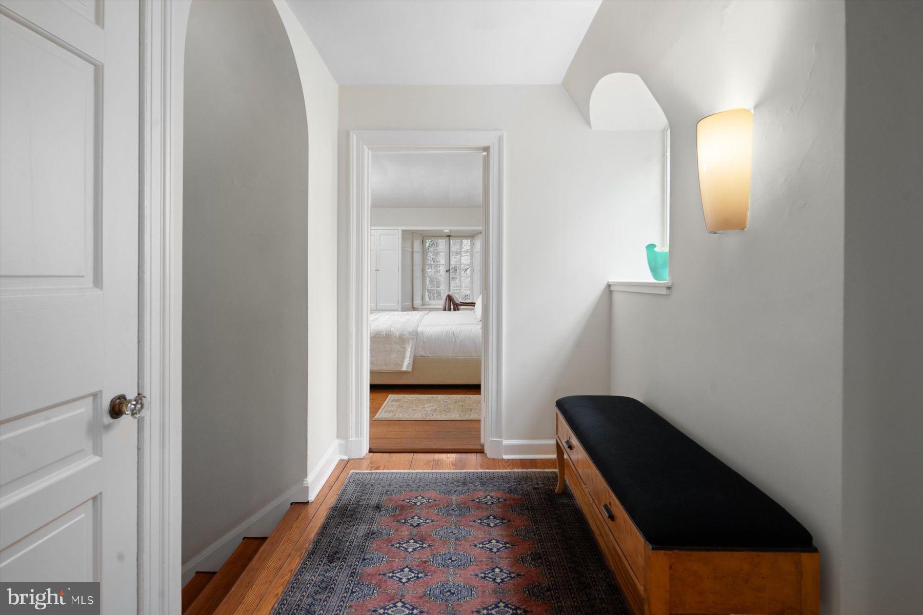 95 West Hampton Road Philadelphia, PA 19118 - Photo 22 of 37 a bedroom with a bed and a mirror