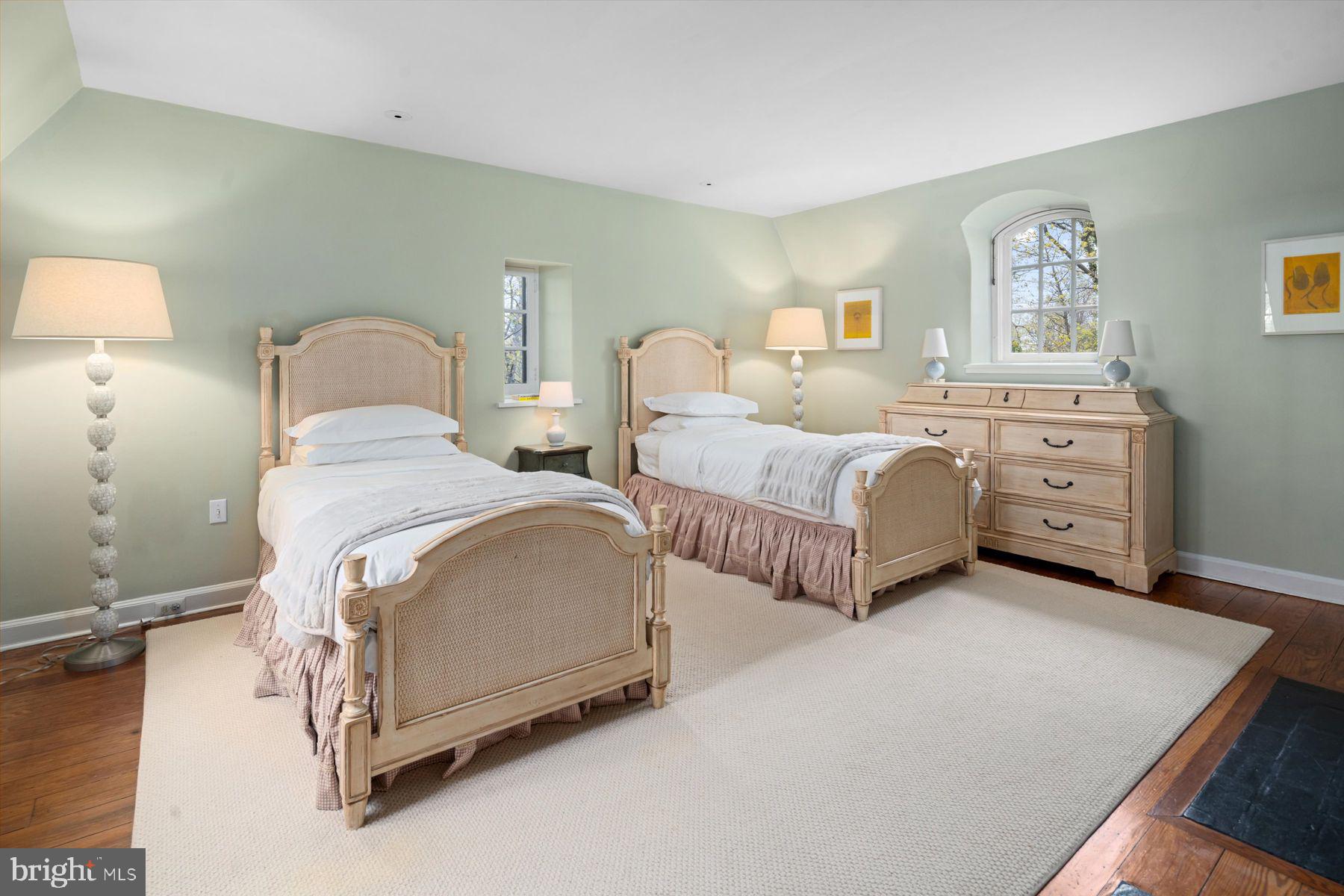 95 West Hampton Road Philadelphia, PA 19118 - Photo 26 of 37 a bedroom with two beds and painting on the wall