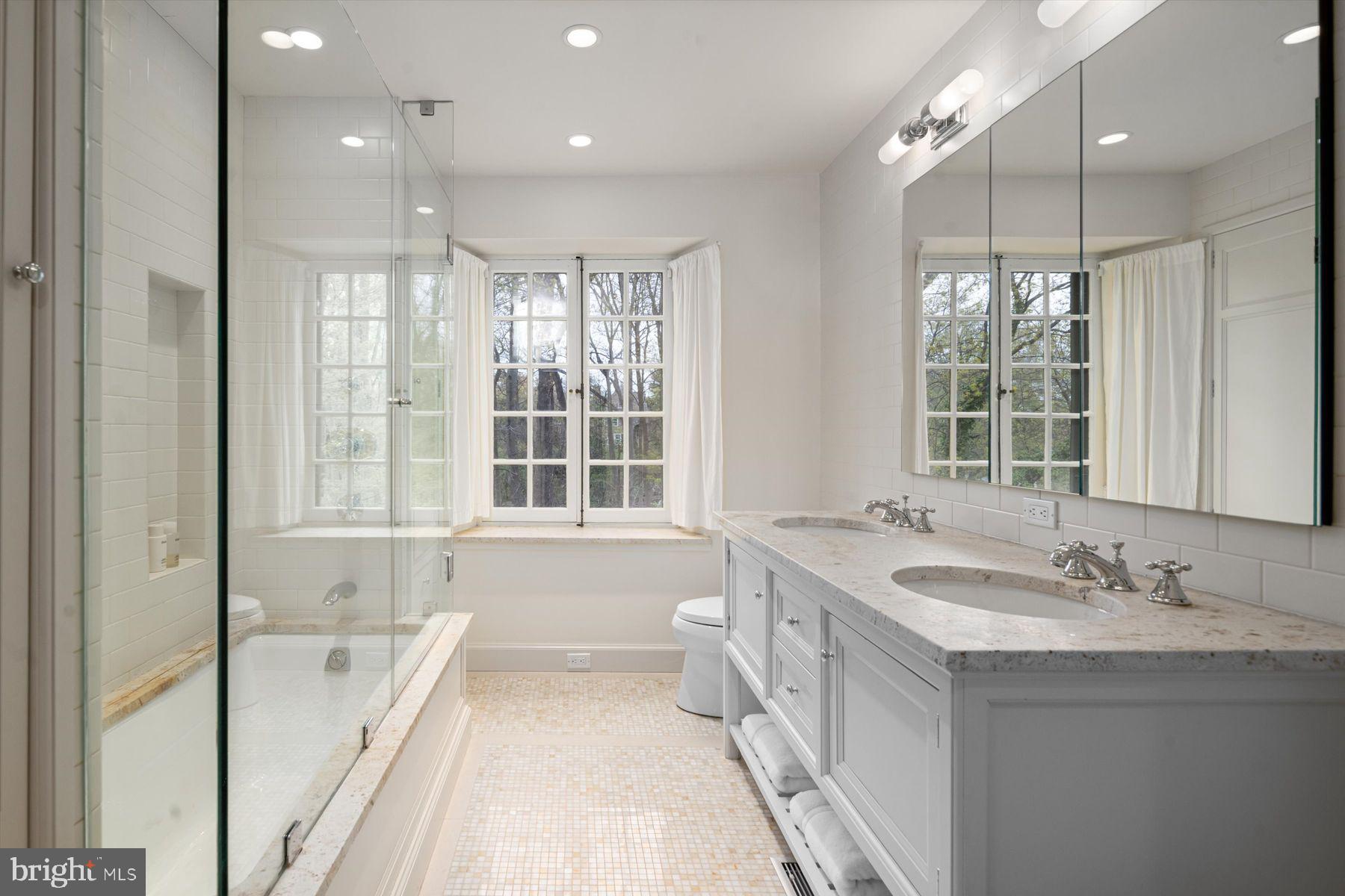 95 West Hampton Road Philadelphia, PA 19118 - Photo 27 of 37 a bathroom with a tub sink and mirror