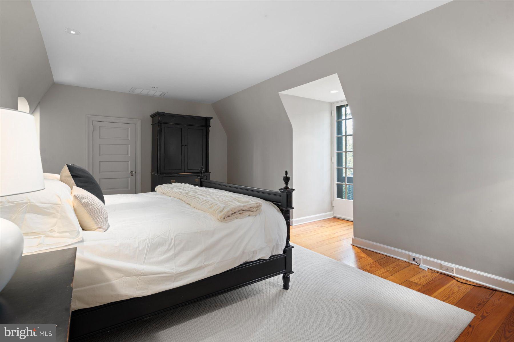 95 West Hampton Road Philadelphia, PA 19118 - Photo 29 of 37 a bedroom with a bed and a window