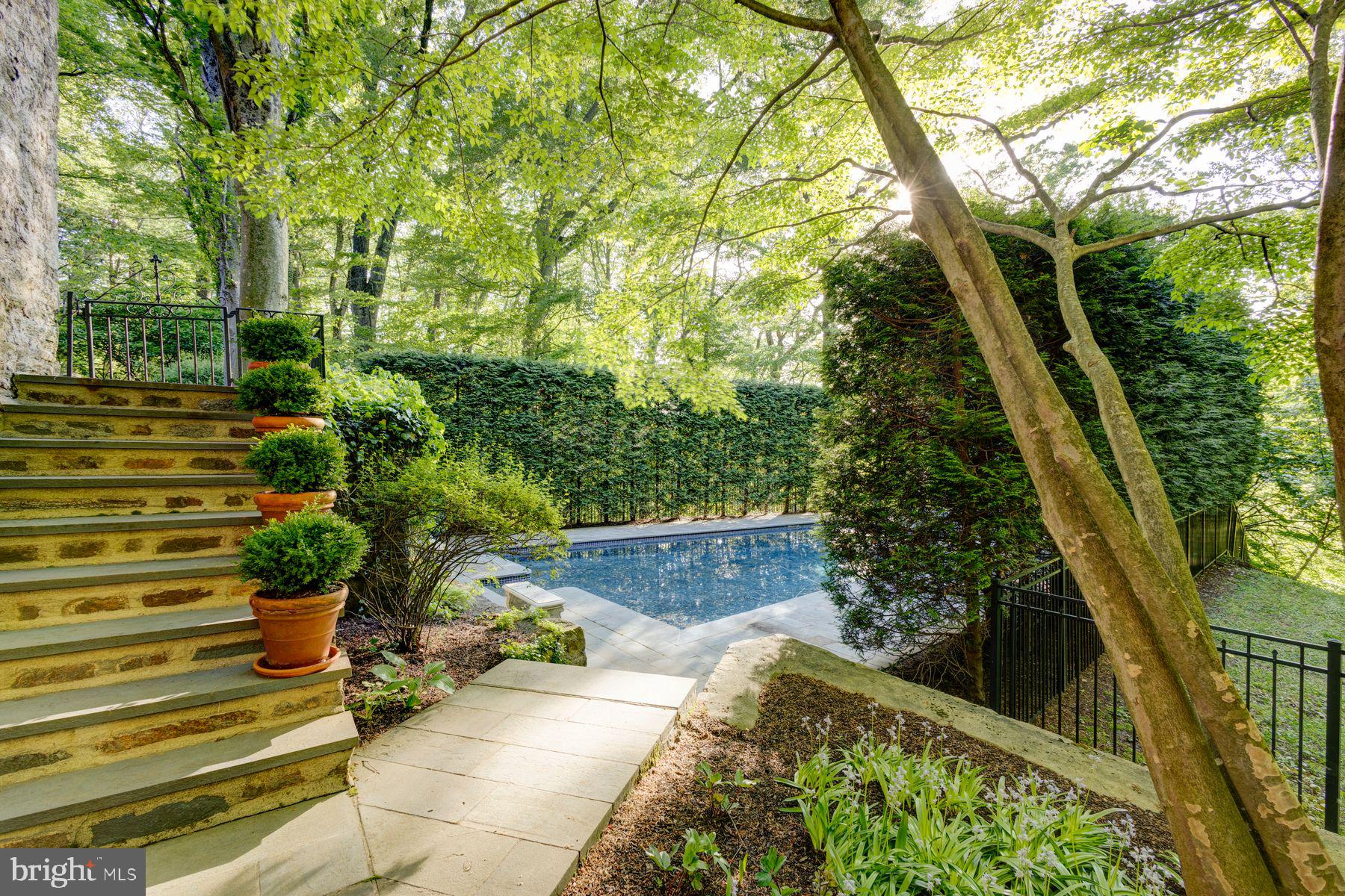 95 West Hampton Road Philadelphia, PA 19118 - Photo 32 of 37 a backyard of a house with lots of green space