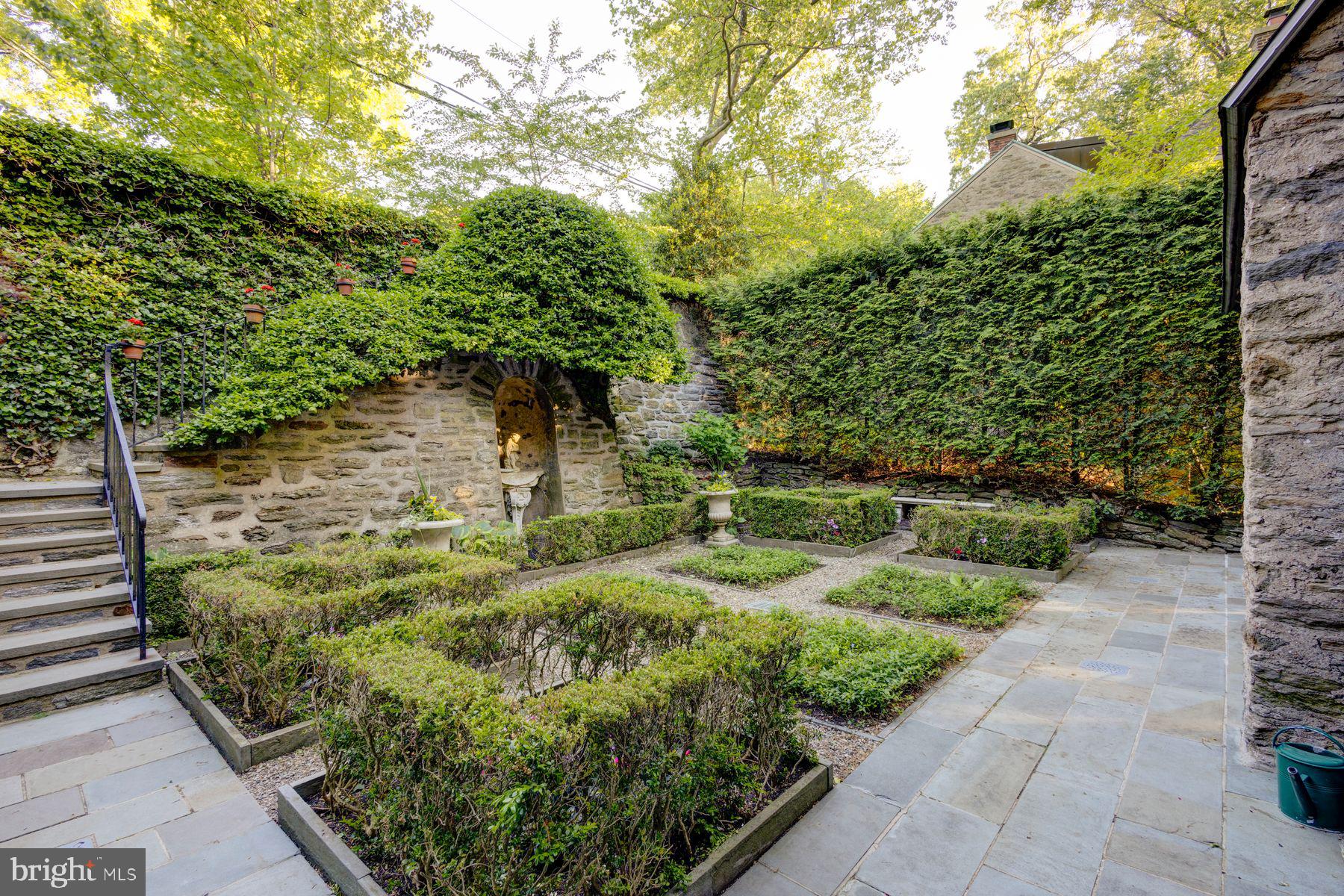 95 West Hampton Road Philadelphia, PA 19118 - Photo 4 of 37 a view of a garden with plants