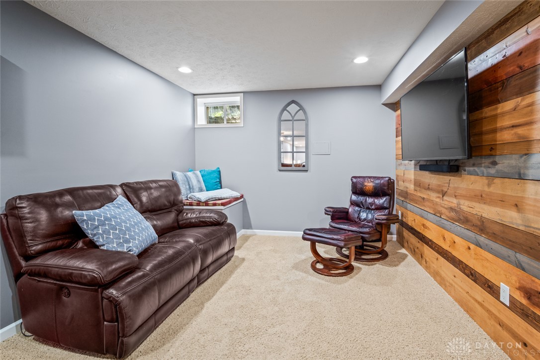 55 Janney Lane Springboro, OH 45066 - Photo 36 of 38 This versatile basement space offers comfort and style, ideal for entertainment or relaxation.