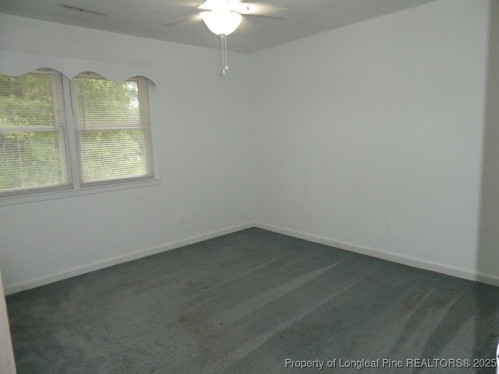 263 Forest Road Lumberton, NC 28358 - Photo 16 of 44 an empty room with a window