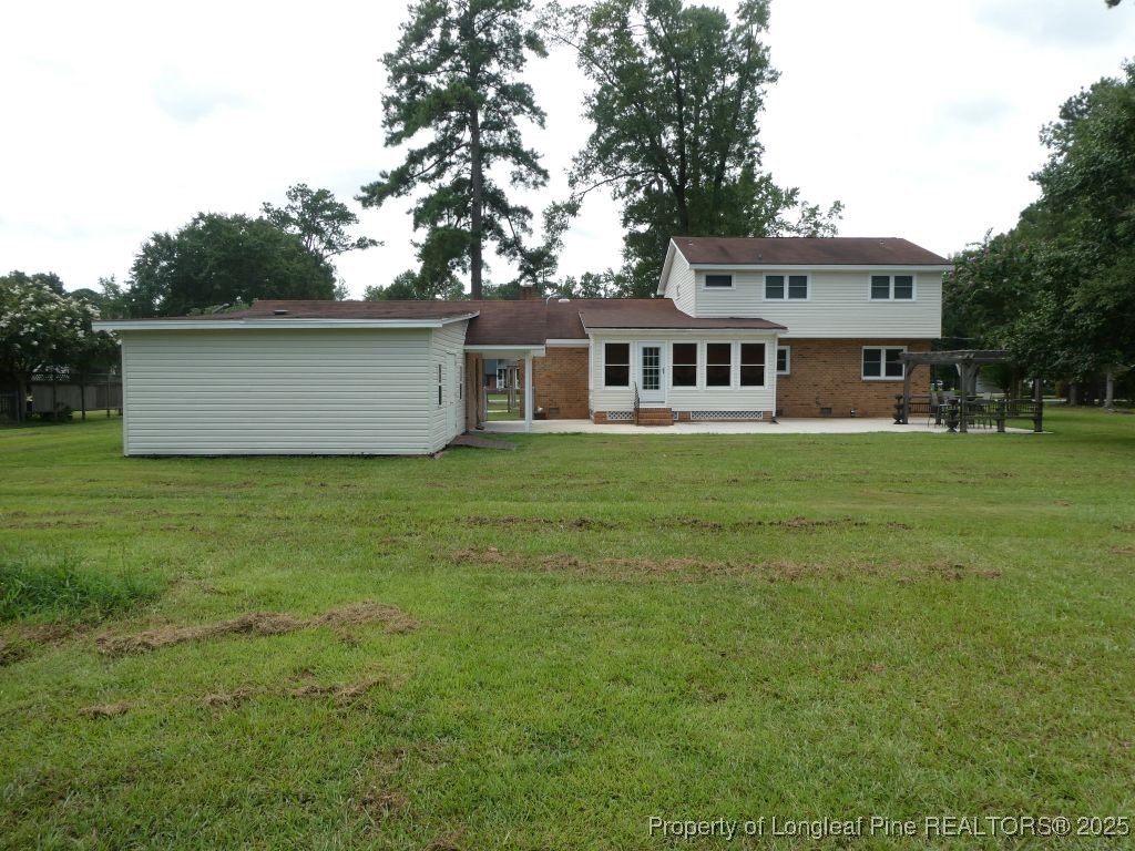 263 Forest Road Lumberton, NC 28358 - Photo 33 of 44 a view of a house with a big yard