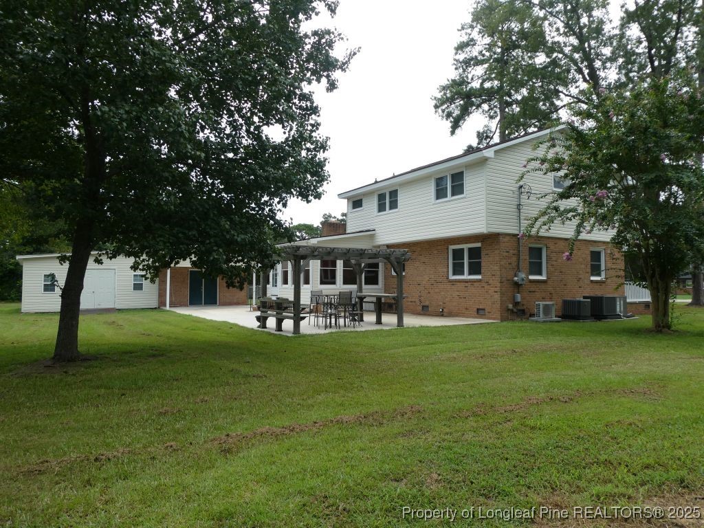 263 Forest Road Lumberton, NC 28358 - Photo 39 of 44 a front view of a house with garden