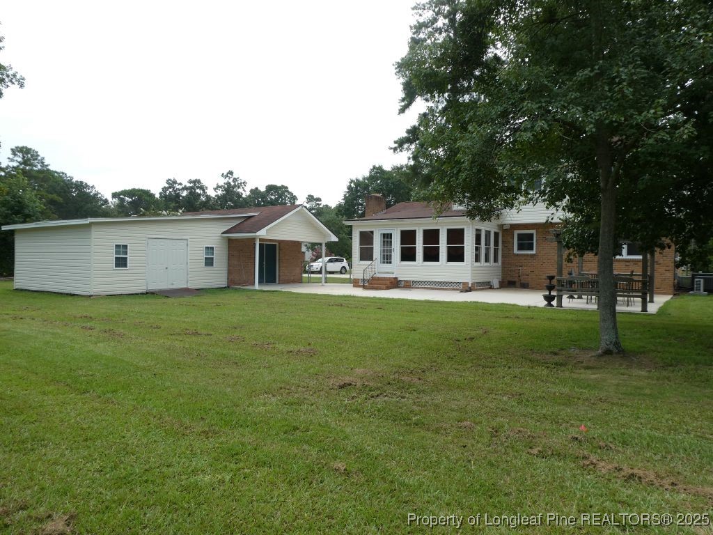 263 Forest Road Lumberton, NC 28358 - Photo 4 of 44 a front view of house with yard and green space