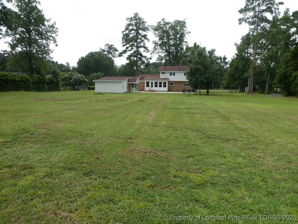263 Forest Road Lumberton, NC 28358 - Photo 41 of 44 a view of a house with a yard