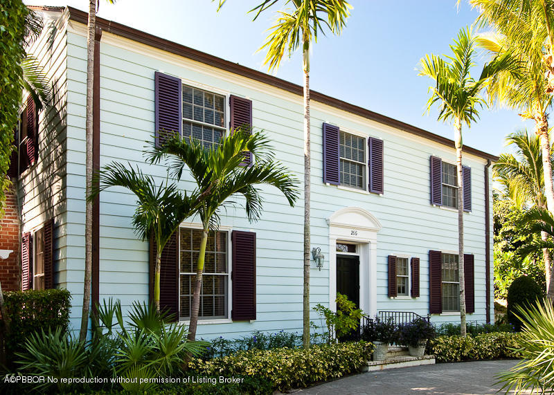 266 Monterey Road Palm Beach, FL 33480 - Photo 1 of 16 a front view of a house with a tree