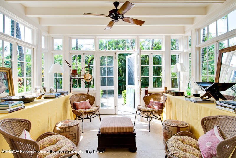 266 Monterey Road Palm Beach, FL 33480 - Photo 3 of 16 a living room filled with furniture and floor to ceiling windows