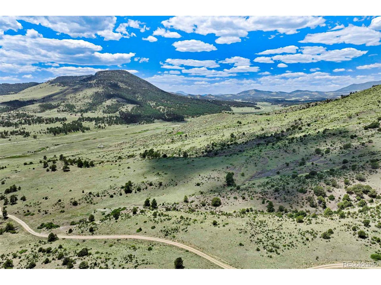3 County Road 102 Guffey, CO 80820 - Photo 7 of 16 a view of a lake with a mountain