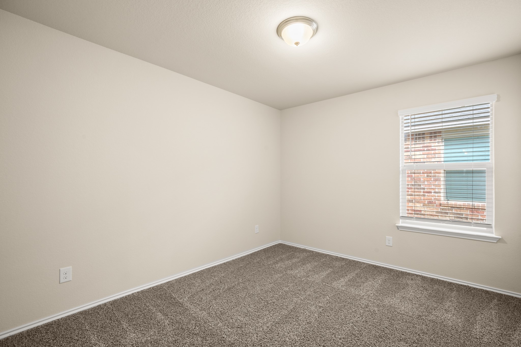 5526 Perdita Drive Belton, TX 76513 - Photo 19 of 26 Empty room featuring baseboards and dark colored carpet