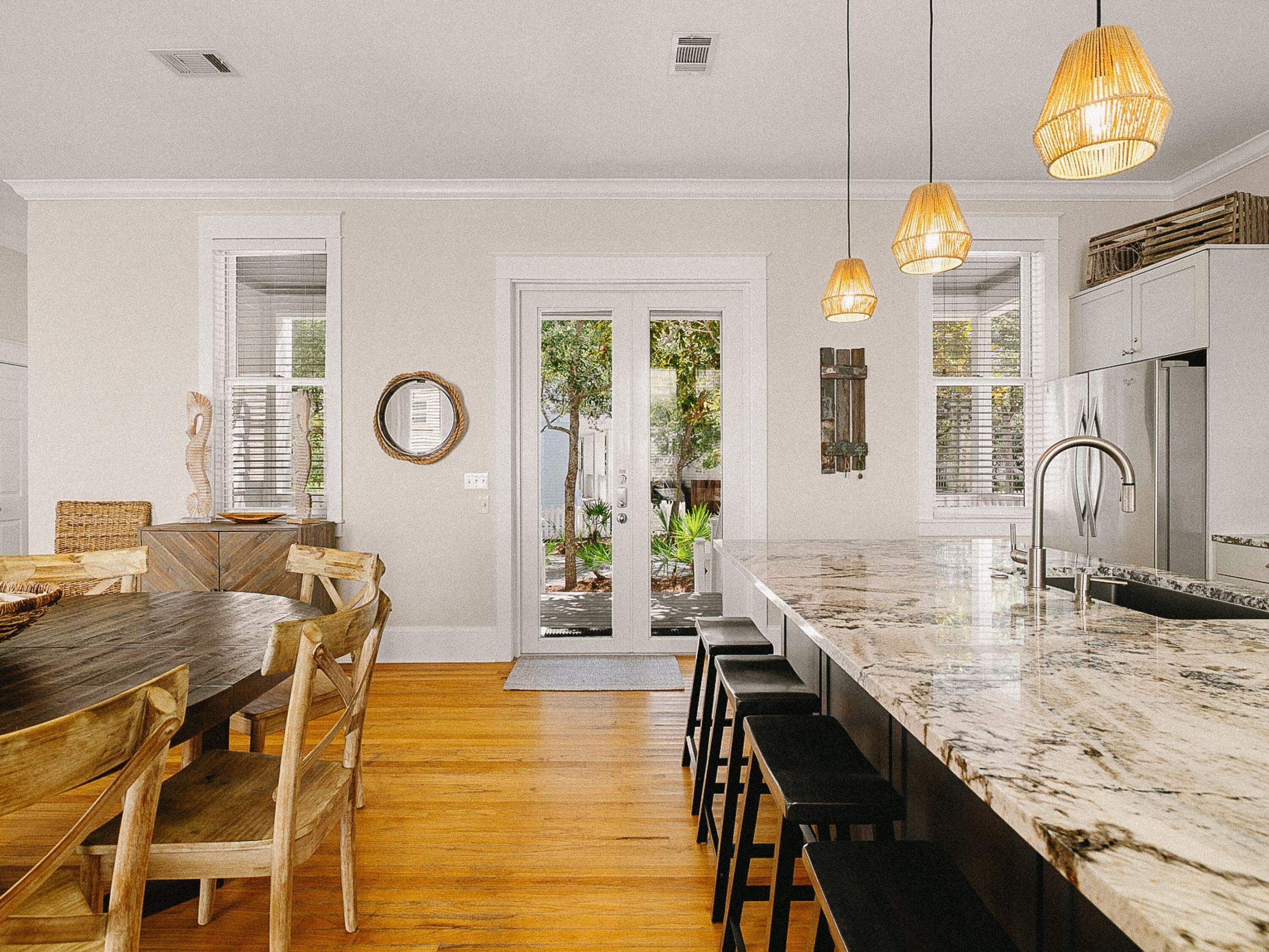 107 Chelsea Loop Road Santa Rosa Beach, FL 32459 - Photo 10 of 28 a view of a dining room with furniture and a chandelier