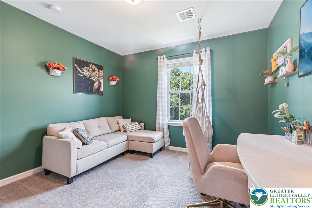 3334 Coventry Drive Lower Macungie Township, PA 18062 - Photo 36 of 51 a living room with furniture and a window