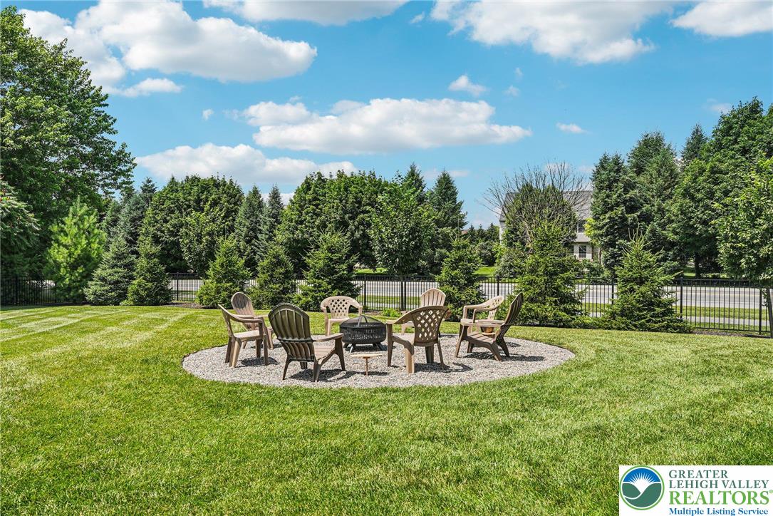 3334 Coventry Drive Lower Macungie Township, PA 18062 - Photo 46 of 51 a view of a table and chairs in the garden