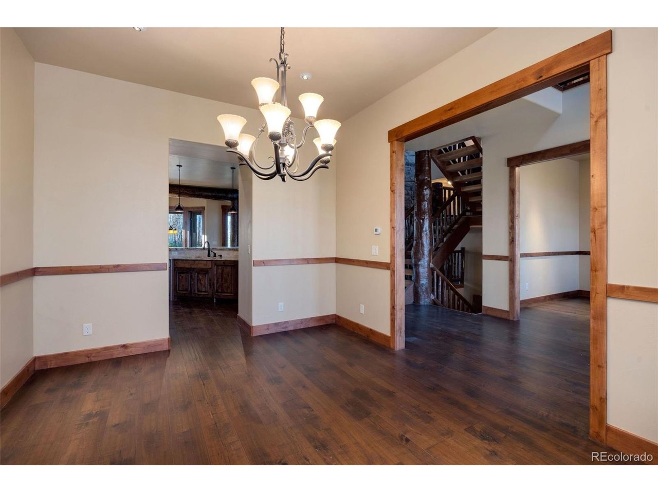 5200 Jackson Road Walden, CO 80480 - Photo 13 of 40 Formal dining area off of main kitchen next to foyer and across from the office
