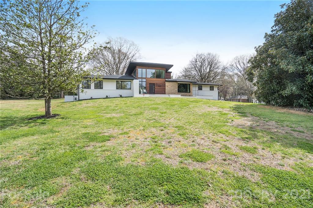 5201 Addison Drive Charlotte, NC 28211 - Photo 2 of 48 a house view with a garden space