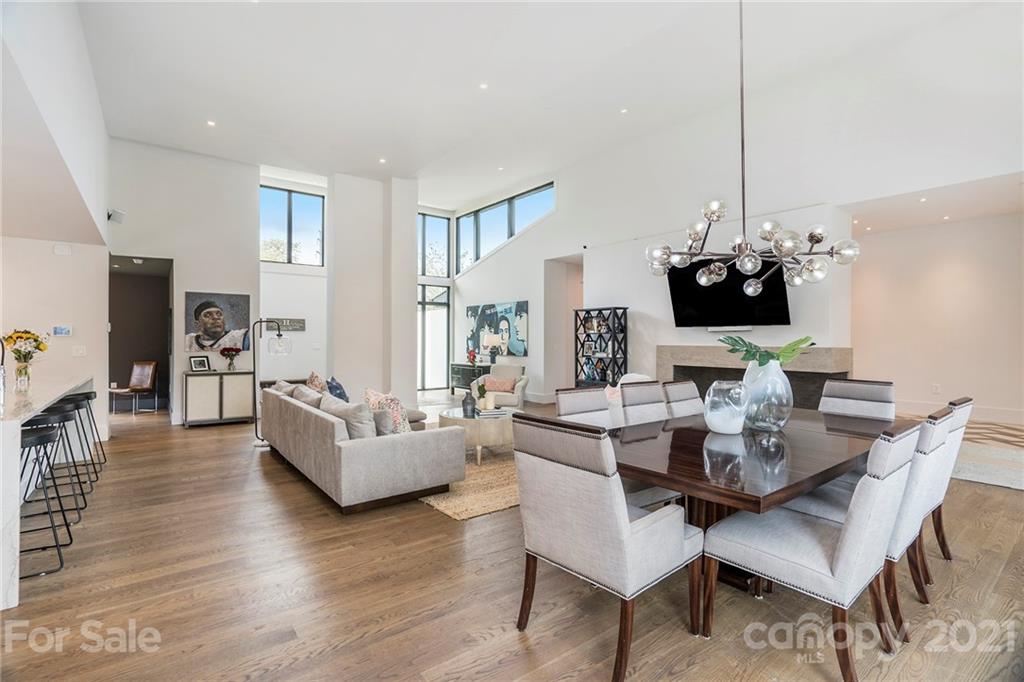5201 Addison Drive Charlotte, NC 28211 - Photo 11 of 48 a view of a livingroom with furniture and a flat screen tv