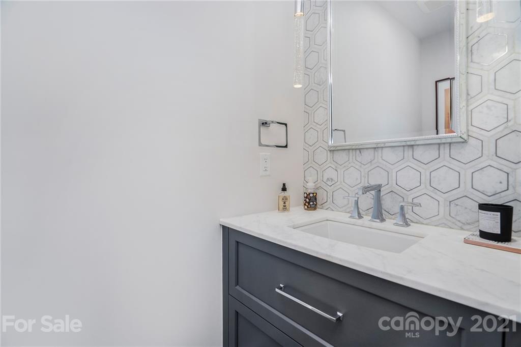 5201 Addison Drive Charlotte, NC 28211 - Photo 25 of 48 a bathroom with a sink and a mirror