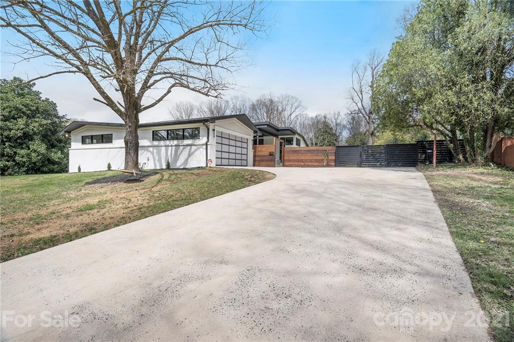 5201 Addison Drive Charlotte, NC 28211 - Photo 42 of 48 a view of house with yard and trees around