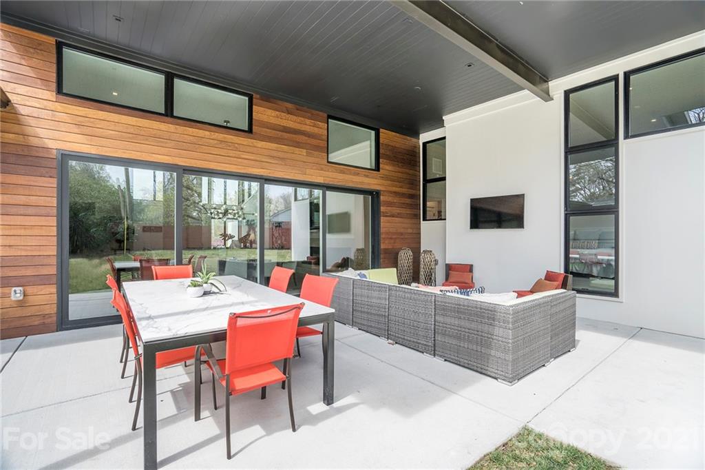 5201 Addison Drive Charlotte, NC 28211 - Photo 44 of 48 a outdoor space with patio the couches and a dining table with garden view