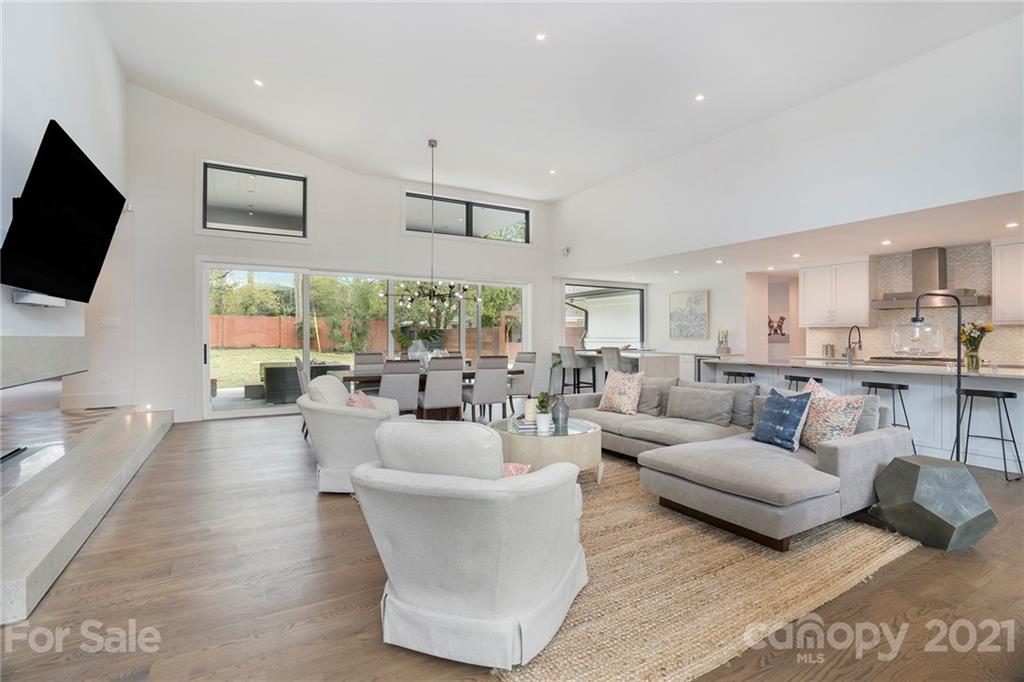 5201 Addison Drive Charlotte, NC 28211 - Photo 6 of 48 a living room with furniture and a flat screen tv