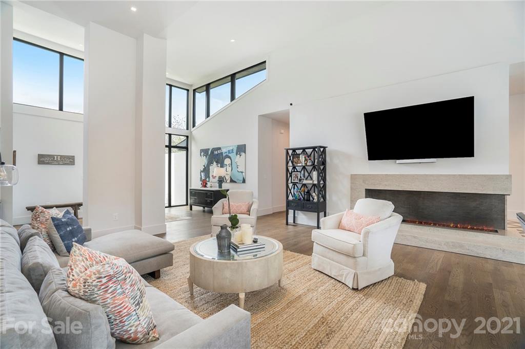 5201 Addison Drive Charlotte, NC 28211 - Photo 7 of 48 a living room with furniture and a flat screen tv