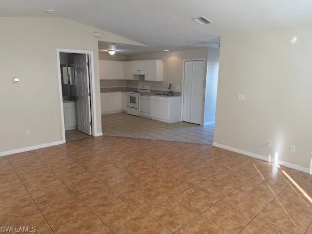 a view of a kitchen with a sink
