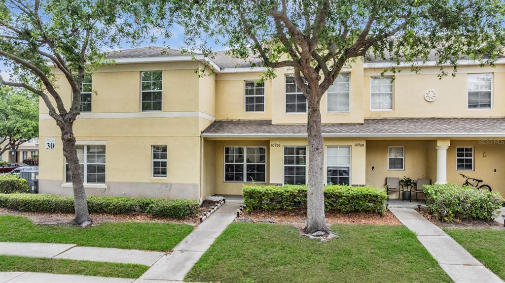 10906 Keys Gate Drive Riverview, FL 33579 - Photo 1 of 37 front view of a house with a yard
