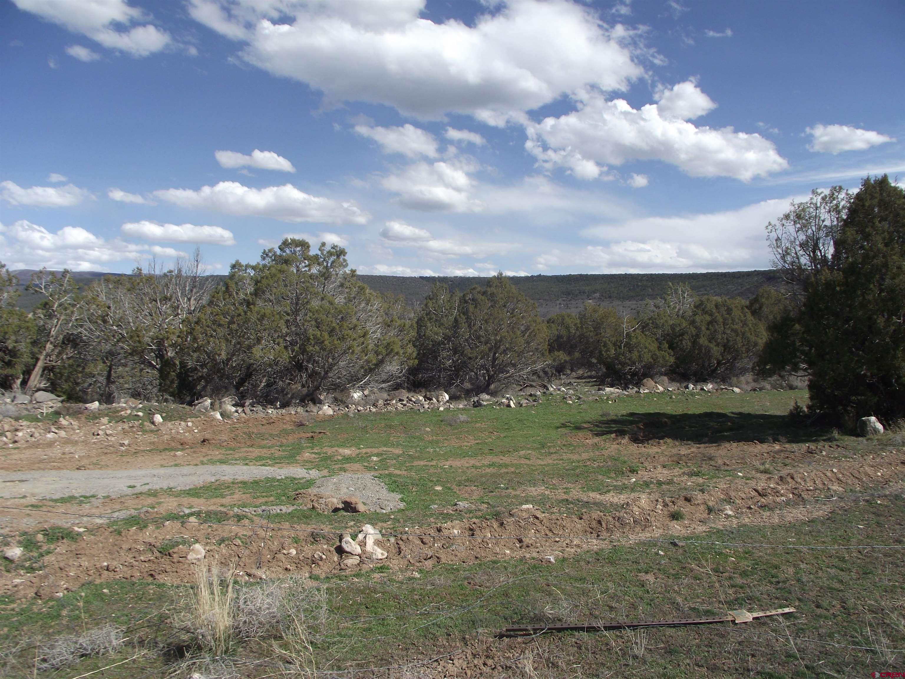 15842 Heavens View Road Cedaredge, CO 81413 - Photo 7 of 28 a view of a lake view with houses in back