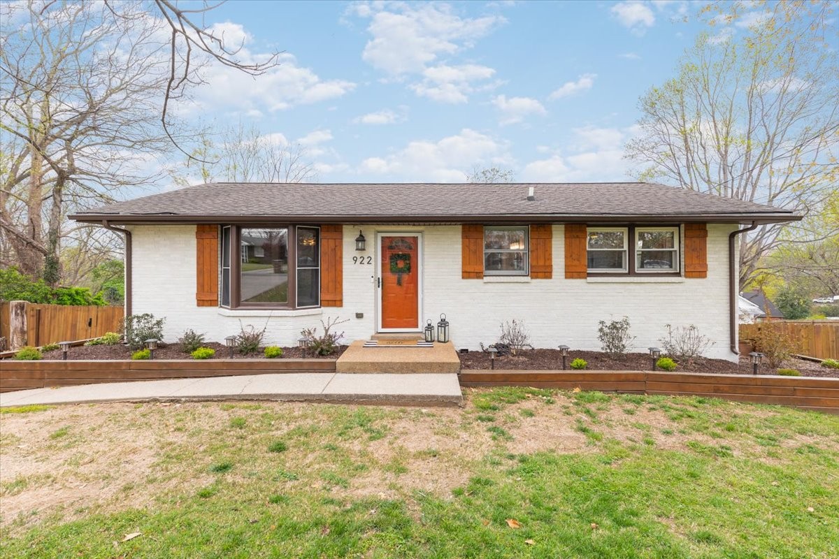 922 Potter Lane Nashville, TN 37206 - Photo 1 of 42 a front view of a house with a yard