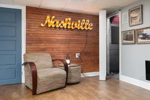 a view of a door and chair in the room