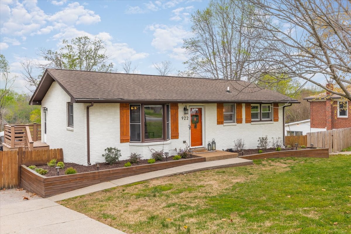922 Potter Lane Nashville, TN 37206 - Photo 3 of 42 a front view of a house with swimming pool