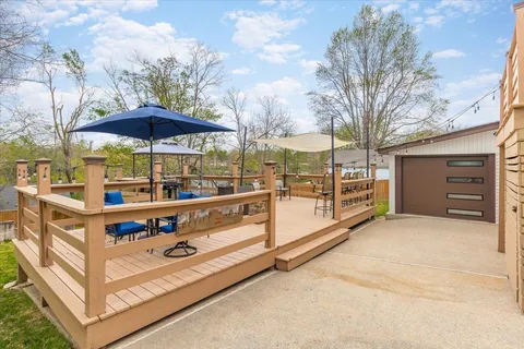 a view of a terrace with a barbeque