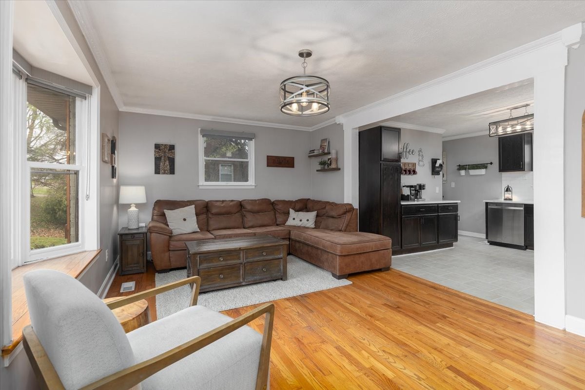 922 Potter Lane Nashville, TN 37206 - Photo 6 of 42 a living room with furniture wooden floor and a large window