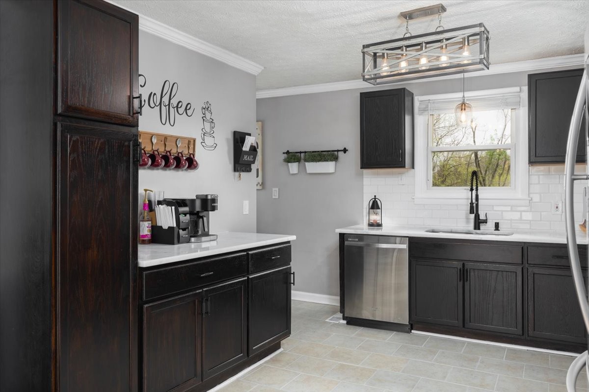 922 Potter Lane Nashville, TN 37206 - Photo 10 of 42 a kitchen with a sink and cabinets