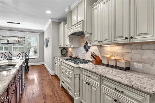 a living room with furniture and a area