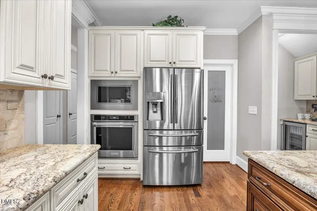 a bedroom with a bed and furniture