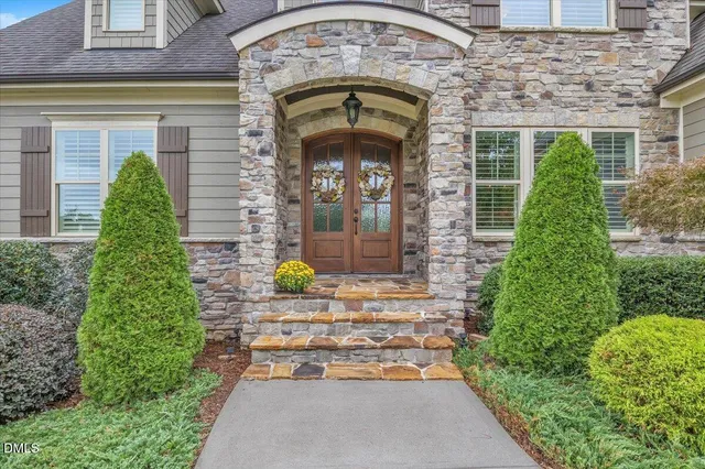 a living room with furniture fireplace and a flat screen tv