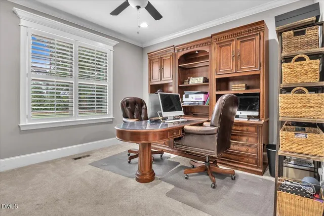 a bedroom with a bed dresser and a window