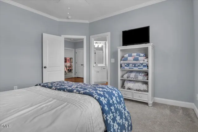 an aerial view of a house with a swimming pool