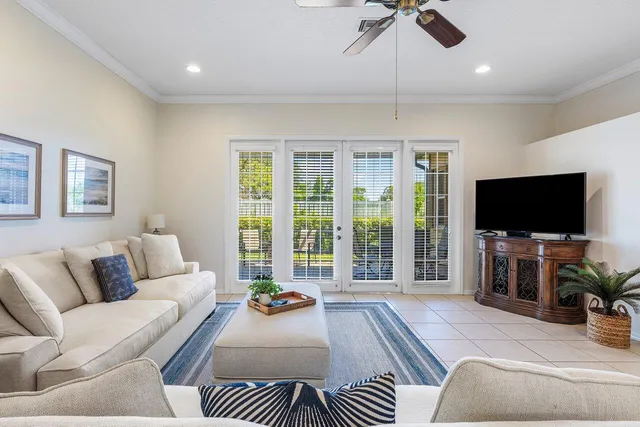 a living room with furniture and a rug