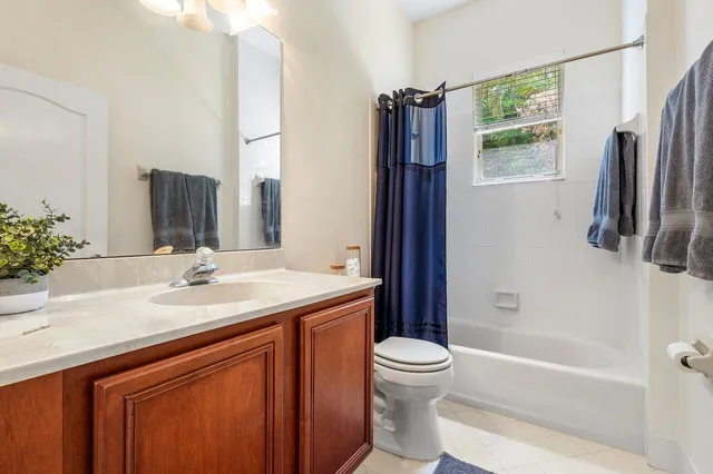 a bed room with a bed and a window