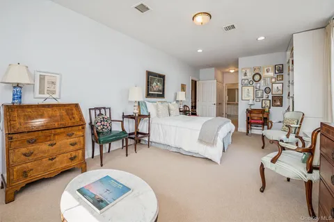 a bedroom with furniture and a couch