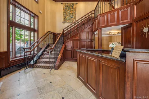 a view of entryway with a front door