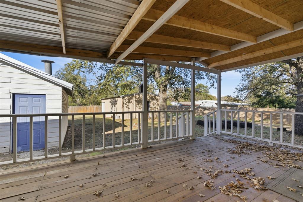 917 Carpenter Street Azle, TX 76020 - Photo 21 of 40 a view of a chairs and wooden floor
