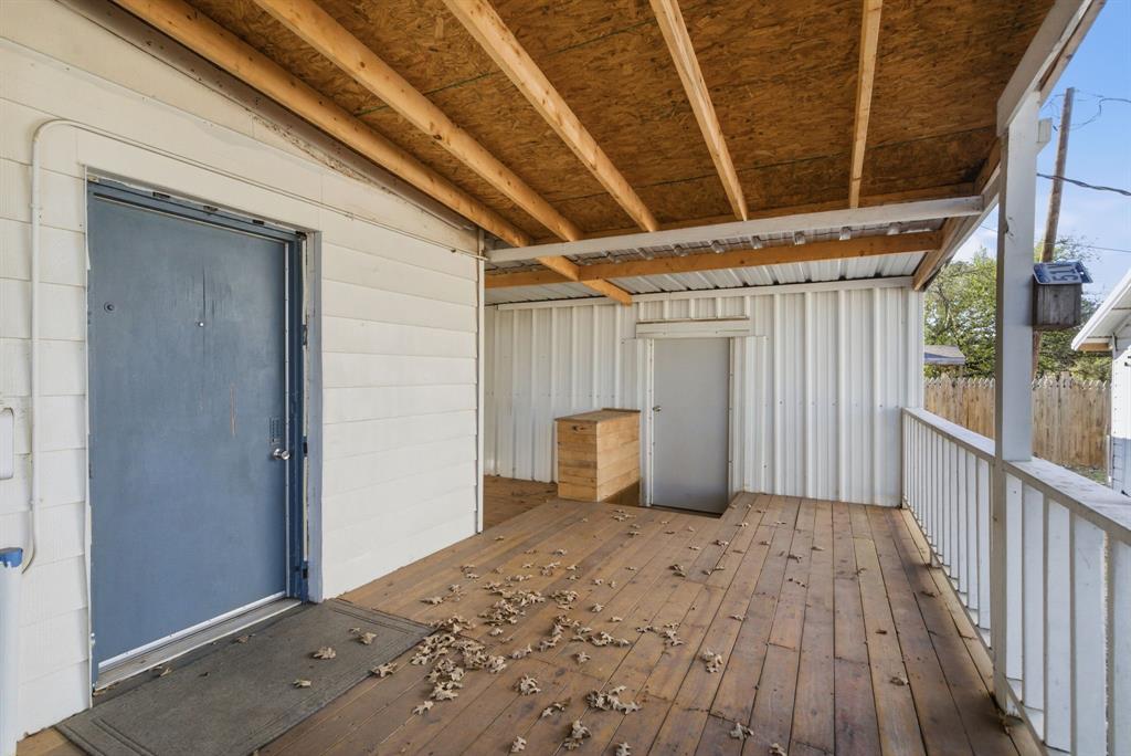 917 Carpenter Street Azle, TX 76020 - Photo 22 of 40 a view of a backyard of a house