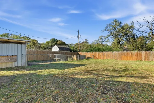 a house view with a garden space