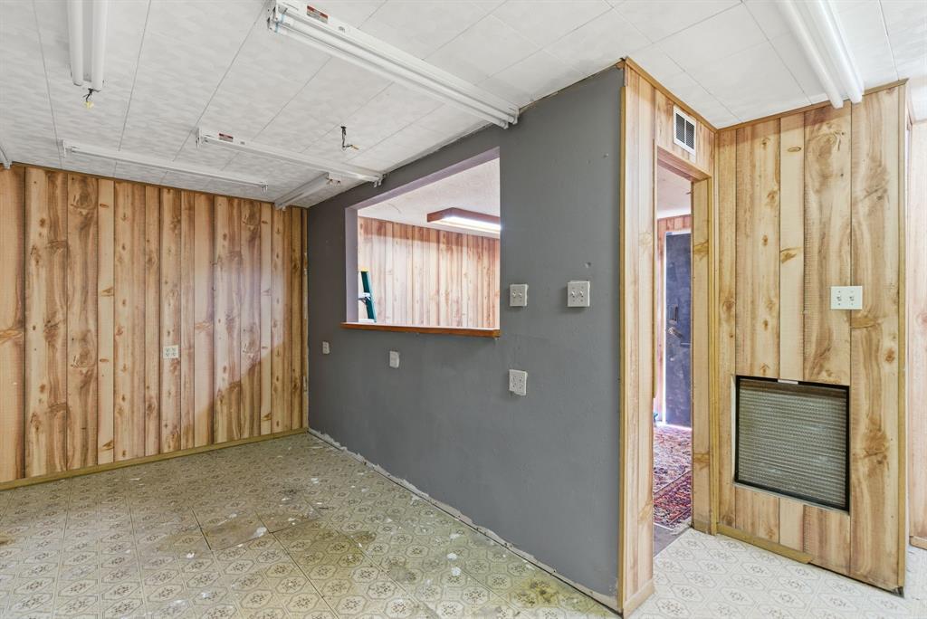 917 Carpenter Street Azle, TX 76020 - Photo 30 of 40 a view of a bathroom with a shower and a sink